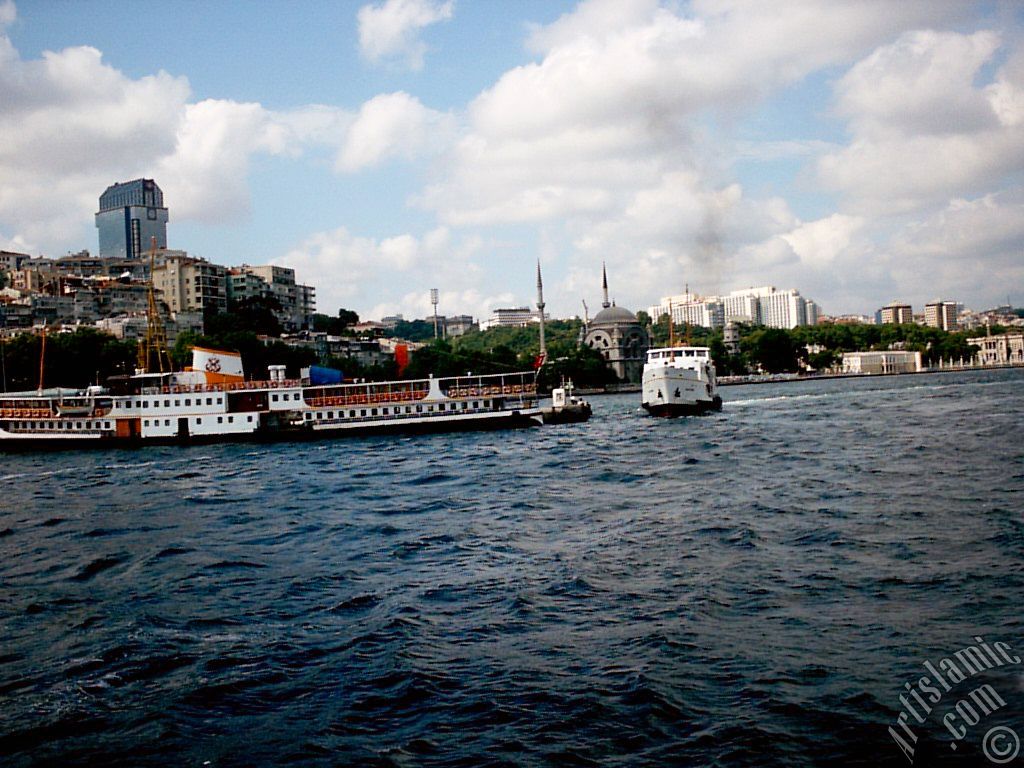 View of Kabatas coast and Valide Sultan Mosque at distant from the Bosphorus in Istanbul city of Turkey.
