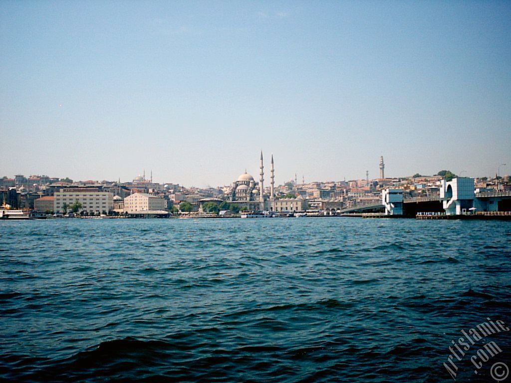 View of Eminonu coast, (from left) Sultan Ahmet Mosque (Blue Mosque), Yeni Cami (Mosque), (at far behind) Beyazit Mosque, Beyazit Tower and Galata Brigde from the shore of Karakoy in Istanbul city of Turkey.
