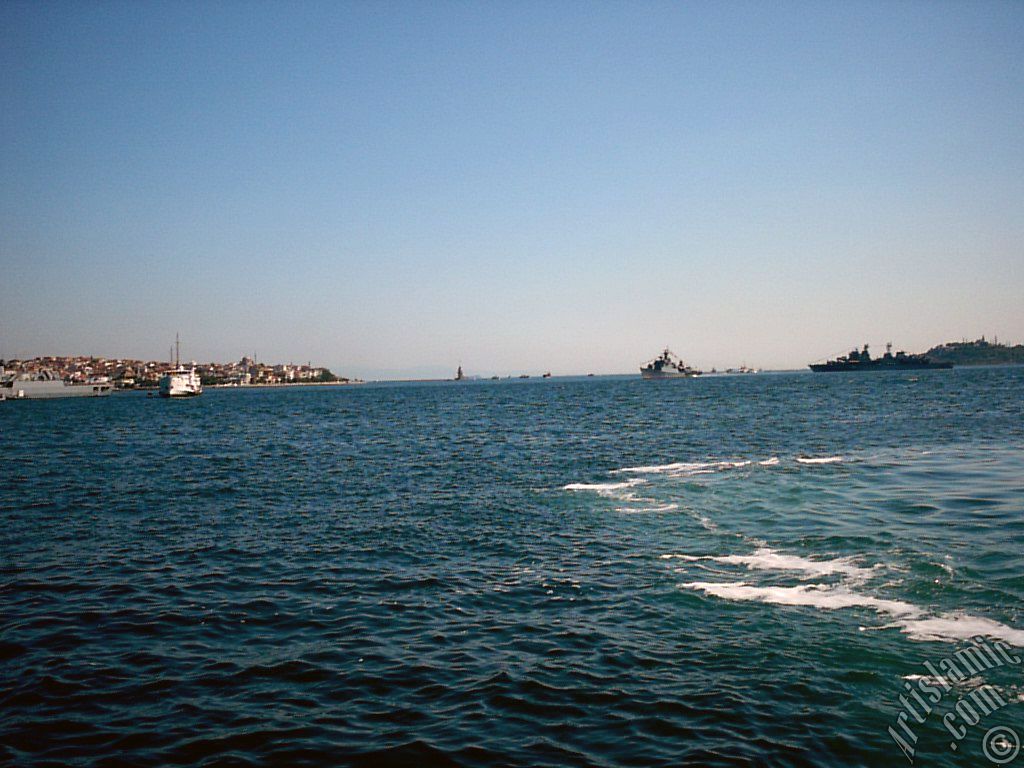 View of froth on the sea seen after a ship landed, on the horizon Kiz Kulesi (Maiden`s Tower), Uskudar coast on the left and Sarayburnu coast on the rigth from the shore of Besiktas in Istanbul city of Turkey.
